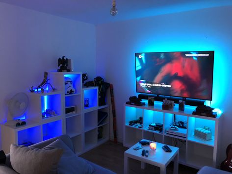 Ikea Kallax units with led lighting Ikea Kallax Game Room, Mens Bedroom With Gaming Setup, Ikea Kallax Gaming Room, Kallax Game Room, Boy Room Ideas Teenagers Led Lights, Led Boys Bedroom, Boys Led Bedroom Ideas, Boys Room With Led Lights, Teenage Boys Bedroom Ideas Led Lights