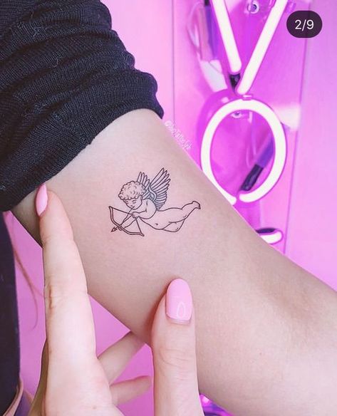 - ̗̀ @𝘢𝘷𝘰𝘤𝘢𝘥𝘵𝘰 ☽ Cupid Tattoo, Cherub Tattoo, Mini Tattoo, Red Ink Tattoos, Geniale Tattoos, Discreet Tattoos, Dainty Tattoos, Baby Tattoos, Dope Tattoos