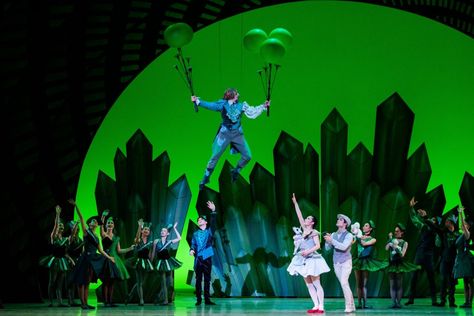 RWB's The Wizard of Oz- The Wizard flies through the air in Emerald City Emerald City Set Design, Wizard Of Oz Ballet, Cincinnati Ballet, Theater Sets, Theater Props, Wizard Of Oz Play, Wizard Of Oz Decor, Ballet Shows, Stage Ideas