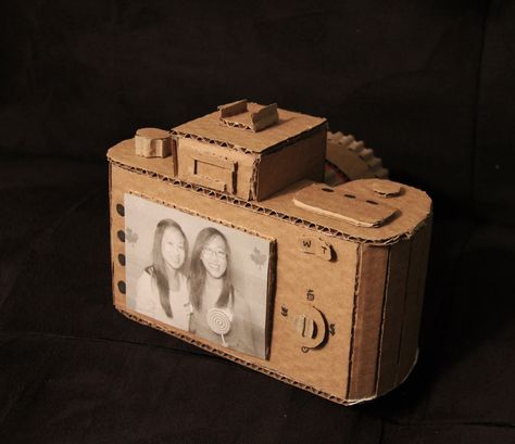 If I was to do a camera like this I would take their idea, or cut a whole where the screen is supposed to be, so that when you move the screen moves as well. Just like a real one. How To Make A Camera Out Of Paper, Cardboard Camera Gift, How To Make A Camera Out Of Cardboard, Camera Box Diy Paper Crafts, Camera Made Out Of Cardboard, Cardboard Camera, Paper Camera, Cardboard Props, Cardboard Ideas