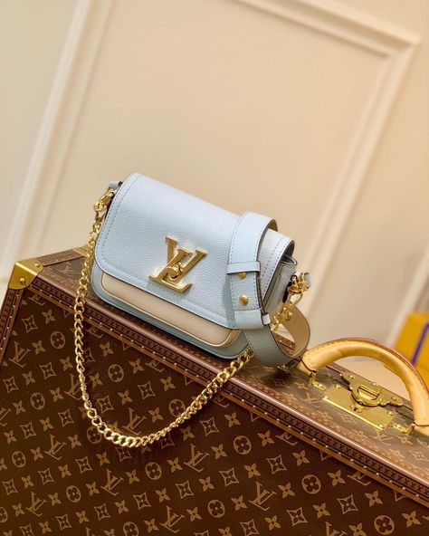 Chanel Bags World on Instagram: “The M59984 Blue Lockme Tender Bag in soft grained calfskin features a metal D-ring for hanging statement accessories. Removable and…” Louis Vuitton Lockme, San Sebastian Spain, Inspired Handbags, Girls Purse, Nicolas Ghesquiere, Handbag Wallet, San Sebastian, Wallet Accessories, Louis Vuitton Bags