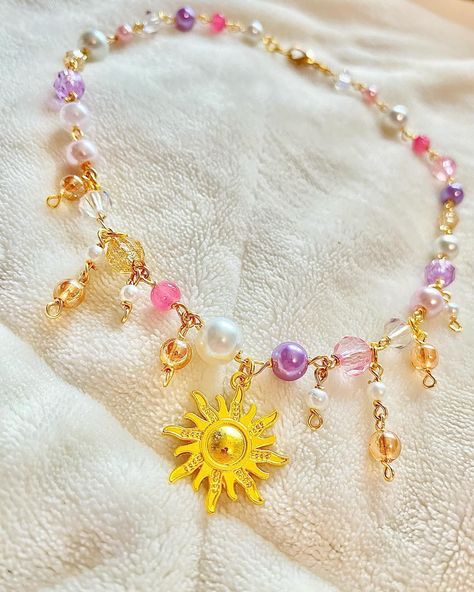 Rapunzel inspired necklace $14 ~ ~ #jewelry #smallbusiness #designer #fairycore #cottagecore #necklace #silver #necklaces #handmade #jewelrymaking #diy #fairy #dreamycore #gold #butterfly #wirewrap #fairycore #fairyaesthetic #darkfairy #cute #princess #rapunzel Rapunzel Necklace, Cottagecore Necklace, Lost Princess, Bracelet Craft, Sun Charm, Princess Rapunzel, Bracelet Craft Diy, Necklaces Handmade, Fairy Aesthetic