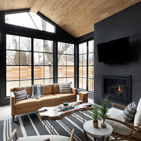 75 Sunroom Ideas You'll Love - March, 2024 | Houzz Jkath Design, Benjamin Moore Wrought Iron, Sleek Fireplace, Four Seasons Room, Sunroom Decorating, Sunroom Designs, Open Dining Room, Screen Porch, Room Additions