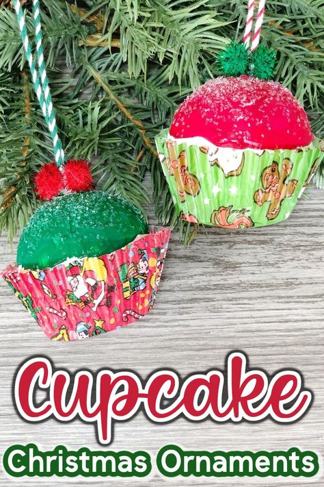 These Christmas Cupcake Ornaments are a sweet treat for your Christmas tree! With just a few simple supplies, you’ll have a great time making this fun and easy holiday craft with the kiddos! Cupcake Liner Christmas Tree Ornaments, Baking Theme Christmas Tree, Diy Cupcake Ornament, Baking Themed Christmas Tree, Diy Food Ornaments, Cupcake Ornaments Diy, Cupcake Christmas Ornaments, Cupcake Craft, Easy Holiday Decorations