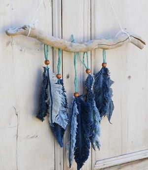 FaveCrafts - 1000s of Free Craft Projects, Patterns, and More Old Jeans Recycle, Artisanats Denim, Feather Wall Decor, Upcycle Crafts Diy, Denim Scraps, Denim Crafts Diy, Feather Wall Hanging, Blue Jeans Crafts, Wine Cork Crafts