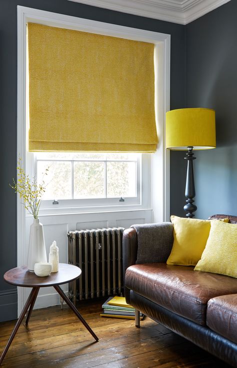 Wooden floors, leather sofa and a pop of yellow with blinds and accessories creates a gorgeous, sophisticated lounge. #LeatherFlooring Roman Blinds Living Room, Windows Decor, Blackout Roman Blinds, Handmade Curtains, Bedroom Blinds, Reception Room, Wooden Floors, Cosy Winter, Yellow Tones