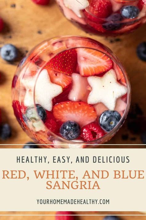 This Red, White, and Blue Sangria is the perfect boozy cocktail to serve when celebrating the 4th of July, Memorial Day, or enjoying the warm weather on hot summer nights! Throw this easy white wine sangria together with just 15 minutes of prep time. Sangria Recipes 4th Of July, July 4th Sangria Recipes, 4th Of July Wine Spritzer, 4th Of July Big Batch Cocktails, Large Batch 4th Of July Cocktail, 4th Of July Sangria Recipes, 4th Of July Batch Cocktails, Fourth Of July Drinks Alcohol Pitcher, Patriotic Sangria