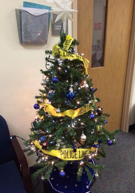 Check out this Christmas tree decorated by a School Resource Officer (SRO). Neat idea for a policeman. #SRO #Christmas #tree Sro Office Ideas, School Resource Officer Office Ideas, Police Officer Christmas Tree, School Resource Officer, Police Appreciation, Police Academy Graduation, Police Wife Life, Christmas Tree Decorated, School Safety