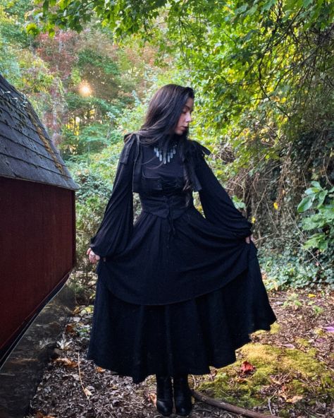 ~• must be the season of the witch •~ 🍂 outfit deets: bishop sleeve dress & corset @nuit.clothing.atelier linen skirt @sondeflor necklace @bellsandthistles_ 🍂 • • • • • #seasonofthewitch #witchyfashion #allblackoutfit #darkcottagecoreaesthetic #darkacademiaaesthetic #darkacademiafashion #fallfashioninspo #whimsigoth #romanticacademia #vampirefashion Goth Witch Outfits, Cottagecore Witch Outfit, Witch Outfit Halloween, Dark Cottagecore Outfits, Witch Outfits, The Season Of The Witch, Witchy Dress, Vampire Fashion, Bishop Sleeve Dress