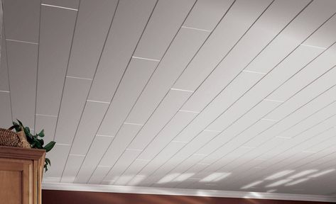 Armstrong Ceilings makes ceiling planks and tiles that can be installed directly over an old popcorn or drop ceiling in just a weekend. Wood Ceiling Planks, Ceiling Planks, Wood Plank Ceiling, Neutral Flooring, Armstrong Ceiling, Plank Ceiling, Janitorial Services, Drop Ceiling, Barn Interior