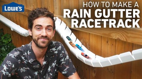 Turn your backyard into a showstopping track for toy cars, golf balls, marble races and more using ordinary rain gutters. Daycare Outdoor, Cars Golf, Pvc Gutters, Giant Yard Games, Toy Race Track, Diy Gutters, 4h Ideas, Marble Tracks, Marble Race