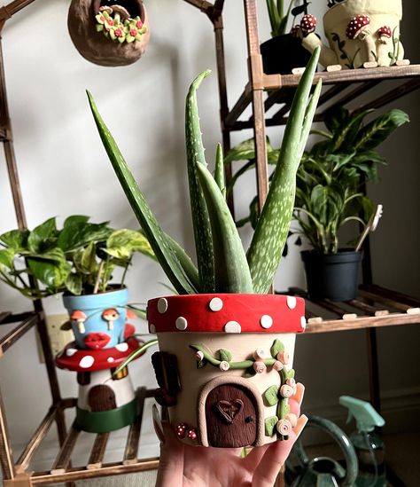 Can you tell I like fairy houses?? #fairycore #plants #clayart #handmade Clay Art Plant Pot, Air Dry Clay Plant Pot Ideas, Creative Plant Pots Ideas, Clay Pots Decoration Ideas, Air Clay Pots, Air Dry Clay Flower Pot Ideas, Clay Fairy Garden Diy, Clay Plant Pot Ideas, Clay Art On Pot