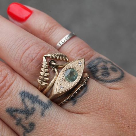 Fiat Lux shared a post on Instagram: "Swamp witch stack. An extra special sapphire Third Eye stacked with Kimi Kaplowitz's Lady Fern & Tiniest Twins with Sofia Zakia's Black Ring of Salt. Today 10/16 is the deadline to order all non-Fiat Lux jewelry for delivery by 12/18. If a size is not currently showing as in-stock, then it must be handmade to order, which takes time! Tap to shop on fiatluxsf.com". Follow their account to see 2010 posts. Lady Fern, Engagement Ring Stacking, Jewelry Mood Board, Mushroom Ring, Stacked Wedding Bands, Ring Pop, Funky Jewelry, Put A Ring On It, Stacking Ring