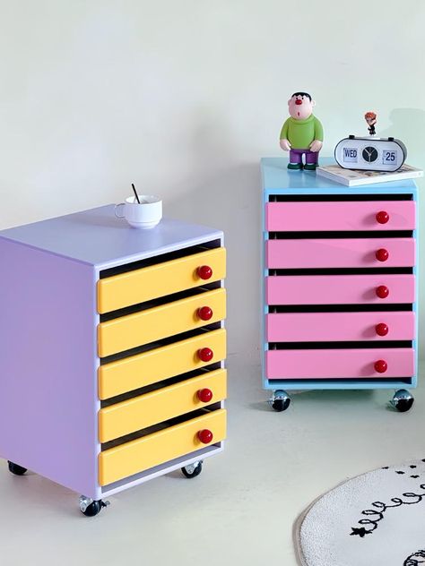 Add a splash of color and functionality to your home or office with our pastel-colored storage cabinet. Designed to keep your space organized while adding a stylish touch, this cabinet is perfect for storing files and other essentials. Enhance your decor with the vibrant elegance of our Pastel Colored Storage Cabinet. Whether used for organizing files or as a decorative piece, it’s sure to add both style and practicality to your space. Specifications Size: L40*W40*H60cm Material: MDF Wood Featur Funky Retro Decor, Weird Interior Design, Pastel Apartment, Kawaii House, Cart Coffee Table, Pastel Home Decor, Kitchen Cups, Colorful Storage, Cute Furniture