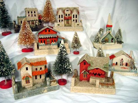 village scene Nice punch of color for a special corner or table.  Really like the white and silver too Putz House Display, Putz Houses Display, Cardboard Christmas Village, Christmas Putz Houses, Cardboard Christmas, Vintage Snowman, Christmas Village Houses, Brush Trees, Glitter Houses