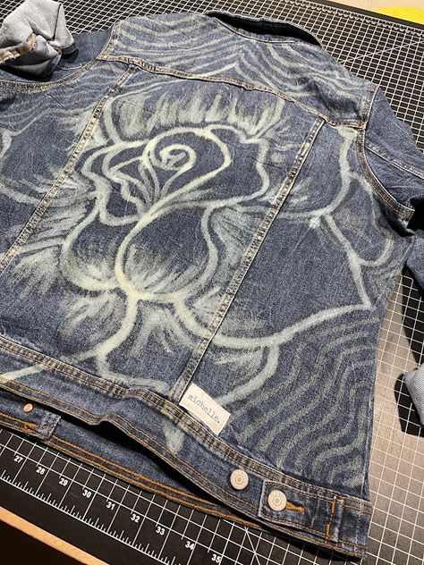 DIY Bleached Denim Jacket: A Rose is a Rose is a Rose....Even if it's on a Jacket!Bleach Art is a great way to give new life to an old denim jacket or new denim.It's a tye-dye alternative and you probably have all the needed supplies right in your home!My client Rosa saw the elephant jacket that I made and wanted some bleach art of her own. She found this picture of a rose, purchased the jacket and I did the rest. DIY Bleached Denim Jacket Bleach Denim Diy, Jean Projects, Bleached Denim Jacket, Bleach Denim, Bleaching Clothes, Jacket Inspiration, Bleached Jeans, Rose Online, Dye Ideas