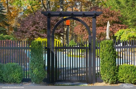 pvc vinyl gate arbor and pergola on a black picket fence from illusions fence Beautiful Pergola, Vinyl Picket Fence, Living Pool, Green Fence, Black Fence, Cheap Fence, Brick Fence, Front Yard Fence, Garden Arbor