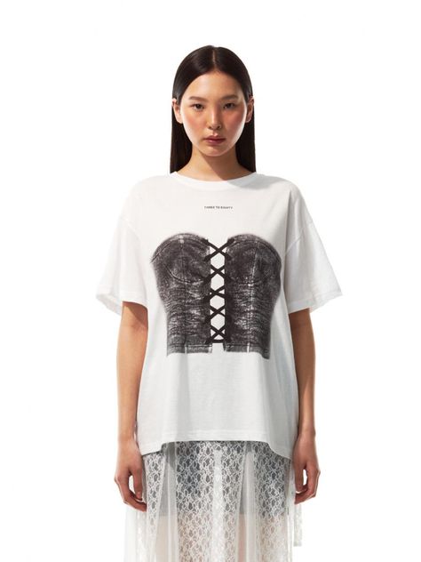 This product skillfully juxtaposes the relaxed fit of a casual T-shirt with the structured design of a printed corset, offering a comfortable yet bold fashion statement. The corset print adds an element of surprise and edginess, contrasting with the T-shirt's simplicity.   - The oversized T-shirt serves as a soft canvas for the intricate corset print, making it a standout piece.- Easy to pair with a variety of bottoms, this top effortlessly transitions from day to night wear.- Breathable fa Corset Tee Shirt Outfit, Corset Illustration, Art Print Corset Top, T Shirt Corset, Corset Graphic Tee, Corset T Shirt, Printed Corset, Corset Shirt, Element Of Surprise