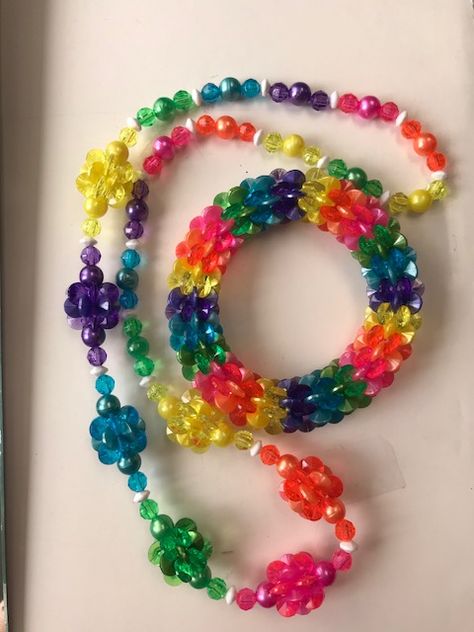 18mm Sunburst Beads, bright transparent and pearl colors! Sunburst Bead Crafts, Rainbow Beaded Bracelets For Rave, Clown Kandi, Colorful Beaded Rave Jewelry, Clowncore Kandi Bracelets, Epic Kandi Cuff, Pony Bead Bracelets, Bracelet Keychains, Kandi Kid