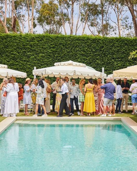 Tommy Collins on Instagram: "Envisioning a memorable summer soirée, @vicky_zaparas looked to Tommy Collins to bring the iconic poolside tableaus of Slim Aarons to life for a day. In their brightest retro-inspired attire, guests milled around a crystal blue pool shaded by pastel sun umbrellas from @danneventhire with midcentury lawn furniture to match. Vibrant tablescapes were arranged with flowers by @andrew_the_florist_ and @lemontreepaperco place settings, while @ashleyjamesonsax entertained Party Around Pool, Slim Aarons Italy, Slim Aarons Pool Party, Slim Aaron’s Party, Slim Aaron’s Wedding, Slim Aarons Wedding, Slim Aarons Aesthetic, Lemon Pool Party, Italian Umbrellas