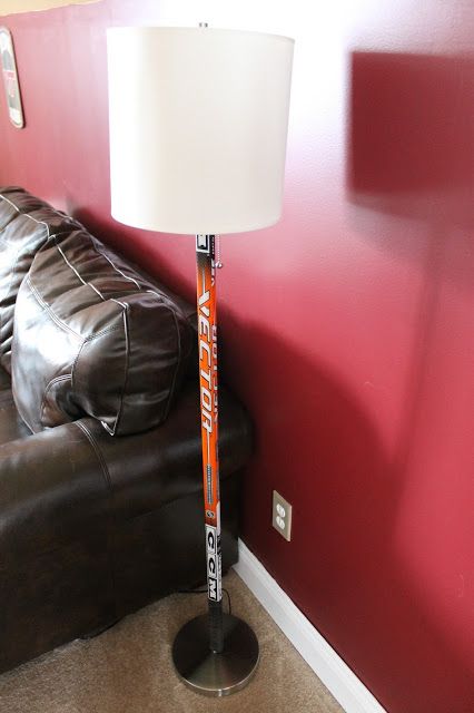 10 Gorgeous DIY Floor Lamps to Brighten Your Space Diy Floor Lamps, Flur Diy, Hockey Stick Furniture, Hockey Stick Crafts, Hockey Man Cave, Hockey Diy, Hockey Crafts, Hockey Bedroom, Diy Floor Lamp