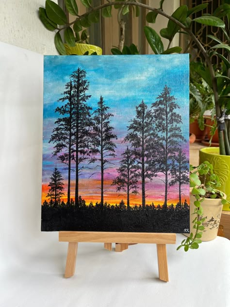 "Sunset silhouettes - Handmade acrylic painting, wall hanging, wall paintings, canvas painting, wall decor, nature painting, original painting easel included Colour - Acrylic colours  Size - 10\" x 12\" Theme - nature painting Materials - Canvas board, acrylic paints, varnish, wooden easel Uses and purpose - Wall hanging, house warming gift, home decor, table decor, gifting item Care instructions - can be cleaned using a dry cloth Note - Please feel free to contact us for any query." Acrylic Painting On Wooden Board, Silhouette Painting Acrylic, 2 Piece Canvas Painting, Canvas Nature Painting, Silhouette Acrylic Painting, Acrylic Painting Sunset, Acrylic Colour Painting, Canvas Painting Wall Decor, Nature Paintings Acrylic