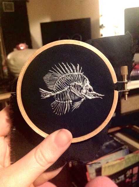 Tiny fish skeleton embroidery. By Lillian Ripley Fish Skeleton Embroidery, Alt Embroidery Ideas, Cryptid Embroidery, Fish Bone Embroidery Design, Creepy Embroidery, Fish Embroidery Designs, Embroidery Skeleton, Edgy Embroidery, Grunge Embroidery