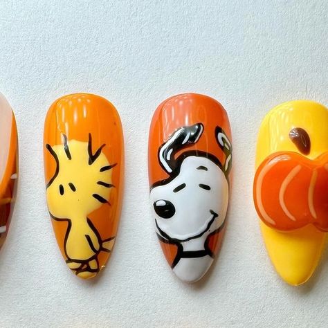 Custom Press On Nails on Instagram: "Snoopy set 🍂🍁⭐️

Custom order for a client! ⭐️ my first character art I’ve ever done on nails and I’m so happy with how these came out! 🥹 it’s so cool for me to see my progression with nail art 

Shape/size: almond/medium 💅🏻
.
.
.
.
.
#pressonnails #custompressons #pressons #snoopynails #snoopy #3dnailart #fallnails #fallnails🍁🍂" Snoopy Thanksgiving Nails, Peanuts Nails, Snoopy Nail Art, Bobs Burgers Christmas, Snoopy Nails, Custom Press On Nails, Thanksgiving Nails, Snoopy Christmas, 3d Nail Art