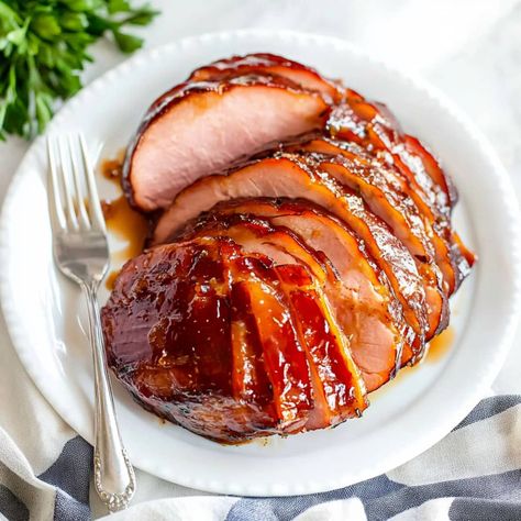 This maple glazed ham recipe is a delightful centerpiece for any festive gathering. You'll love the sweet, tangy glaze and beautifully caramelized crust. Maple Glaze For Ham, Maple Ham Glaze, Glazed Ham Recipes, Maple Glazed Ham Recipes, Glaze For Ham, Maple Ham, Maple Glazed Ham, Maple Syrup Glaze, Roasted Ham