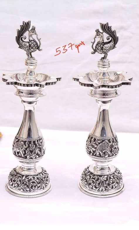 Silver Deepam Design With Grams, Silver Kuthu Vilakku Design, Antique Silver Pooja Items, Silver Deepam Design, Krishna Jula, Silver Deepam, Silver Diya, Sari Draping, Silver Idols