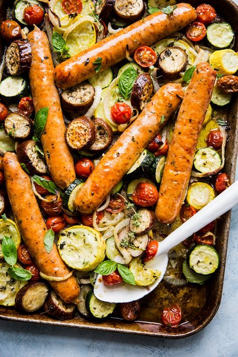 This sheet pan ratatouille recipe celebrates all of the olive-oil soaked flavors of the French country classic, but is bulked up into a one-pan meal thanks to the addition of hearty Italian sausages. Healthy Hot Lunch Ideas, Dinner With Sausage, Ratatouille Ingredients, Easy Ratatouille Recipes, Zucchini Aubergine, Italian Sausages, Veggie Sausage, Ratatouille Recipe, The Modern Proper