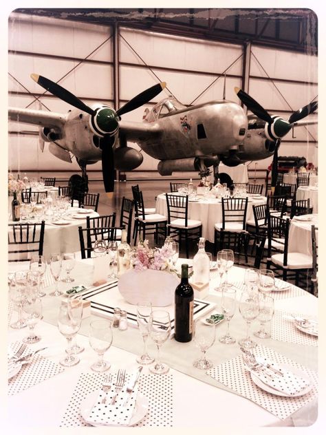 Aviation Wedding @ Yanks Air Museum next to the P-38 Lightning. Travel Theme Wedding Plane Themed Wedding, Aviation Themed Wedding, Airplane Hanger Wedding, Airport Wedding, Pilot Wedding, Aviation Wedding Theme, Hangar Wedding, Airplane Wedding, Aviation Wedding