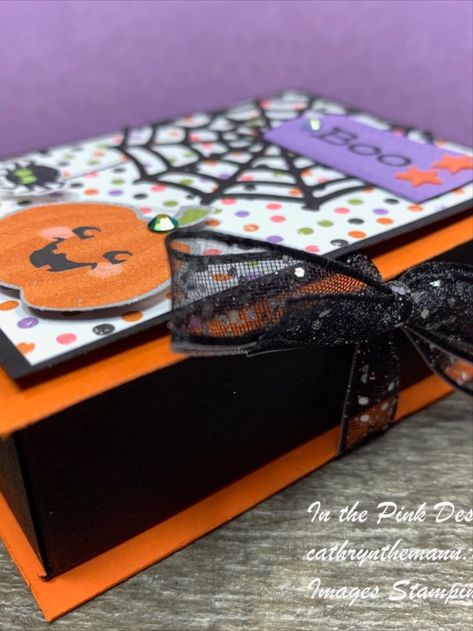 Hi Friends!  My project today is a  3 1/2  x  2 1/2  x  1"  Treat box that opens like a book.  You can fit 3 fun sized candy bars inside.  I used  Cute Halloween Designer Series Paper, Cutest Halloween stamp set, time of Giving stamp set, Frightful Tags dies and Tailor Made Tags dies. Stampin Up Halloween Treat Boxes, Book Treat Boxes, Halloween Treat Boxes Diy, 6x6 Paper Projects, Stampin Up Book Treat Boxes, Diy Halloween Books, Tailor Made Tags Dies, Treat Boxes Diy, Halloween Candy Box