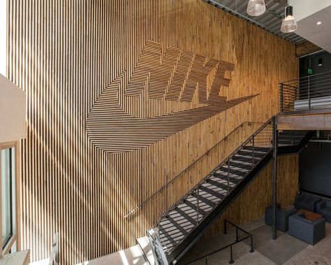 back wall sign behind POS station using faux wood to give texture and dimension Wood Facade, Nike Branding, Contract Design, Interior Design Work, Workspace Design, Nike Brand, Architectural Inspiration, Wall Graphics, Wall Treatments