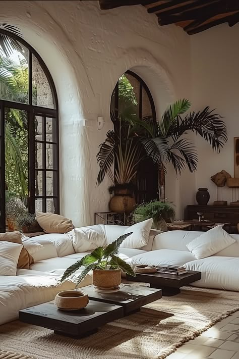 Modular white sofa in a livingroom Spanish Living Room, Mediterranean Living Room, Mediterranean Interior, Mediterranean Living, Aesthetic Living Room, Spanish Style Homes, Spanish House, Mediterranean Home, Mediterranean Homes