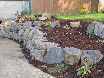 Nice Basalt rock wall..feels somewhat natural especially when compared to man-made products Rock Borders, Rock Wall Landscape, Rock Wall Gardens, Boulder Retaining Wall, Ideas For Small Yards, Rock Retaining Wall, Stone Walls Garden, Backyard Ideas For Small Yards, Basalt Rock