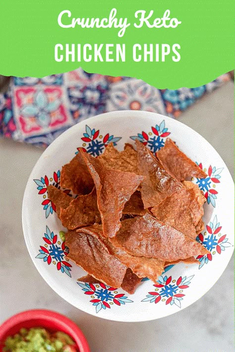 a plate of chicken chips with guacamole on the side Chicken Chips Keto, Chicken Chips Recipe Keto, Wilde Protein Chips, Chicken Chips Recipe, Keto Chicken Nuggets Canned Chicken, Protein Chips Homemade, Crunchy Keto Snacks, Protein Chips Recipe, Carnivore Chips