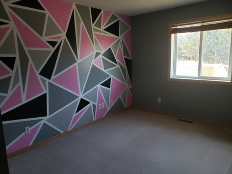 Girls room painted grey with a geometric accent wall with light grey, dark grey, black and pink. Pink Gray Wall Paint, Grey And Pink Walls, Black And Pink Girls Room, Pink And Grey Bedroom Walls, Black Pink And Grey Bedroom Ideas, Dark Grey And Pink Bedroom, Gold Accents Bedroom, Pink Accent Wall, Geometric Accent Wall