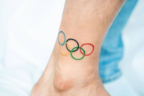 Olympic rings tattoo on the ankle Olympic Rings Tattoo, Olympic Tattoo, Rings Tattoo, Art Sport, Olympic Rings, Barber Shop Decor, Minimalist Line Art, Ring Tattoos, Shop Decor