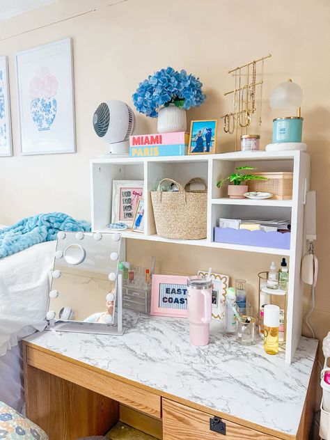 pink and blue decor ideas | dorm desk | desk hutch | hydrangeas | vanity ideas | university of rhode island | uri | aesthetic Nursing School Desk Ideas, Dorm Vanity Ideas, Dorm Desk Organization Ideas, Dormify Room Ideas, Desk Hutch Decor, University Of Rhode Island Aesthetic, Fun Dorm Room Ideas, Fun Apartment Aesthetic, Aesthetic Dorm Desk