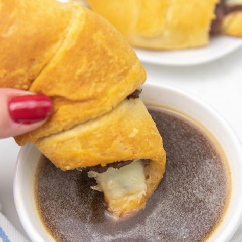 French Dip Crescent Rolls are a simple and easy dinner or appetizer to serve up. Buttery crescent rolls, string cheese and deli cut roast beef. A simple and satisfying dish with a side of au jus for dipping. #crescentrolls #passion4savings #roastbeef #crescentrecipe #easy #quick #dinner #recipe #aujus Crescent Roll Roast Beef Sandwiches, Roast Beef Croissant, Roast Beef French Dip, Roast Beef Au Jus, Rolled Roast Beef, French Dip Crescents, Easy Quick Dinner, Beef Au Jus, Leftover Pot Roast