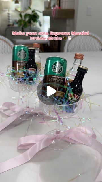 Amber Capps on Instagram: "A make your own espresso martini gift idea✨  I bought a set of coupe glasses from Amazon, tied a ribbon around the bottom of the glass + filled them with irredescent crinkle paper.   I used mini glass bottles and filled them with espresso beans to garnish with, added a can of espresso, mini bottles of vodka and coffee liqueur (I used Bailey’s because it’s the closet I could find in a mini bottle - I would normally use Kahlua ☕️) to each glass.   They were the perfect birthday gift for 2 of my friends who love espresso martinis! (+ so easy to make!)  . . . . . . #espressomartini #espresso #giftideas #giftideasforher #amazongiftideas #amazongiftideas #birthdaygifts #martinicocktail #giftsforher #easygiftideas #coupeglass #amazonfinds" Martini Glass Gift Ideas, Espresso Martini Wedding Favours, Mini Espresso Martini, Wine Glass Gift Ideas Filled Christmas, Espresso Martini Party Favors, Espresso Martini Gift Set, Diy Martini Glasses, How To Decorate Wine Bottles As Gifts, Espresso Martini Kit Gift