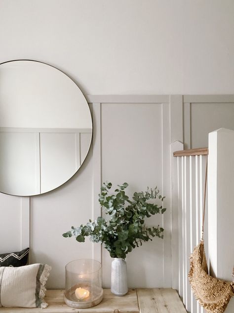 Transforming my 1930s house hallway with DIY panelling, ammonite paint from Farrow & Ball and some scandinavian inspired decorative accessories from Cox & Cox creating a light, bright and fresh space with a boho interior #hallway #hallwaydecor #largecircularmirror #homerenovation #diypannelling #hallwaypannelling #ammonitepaint #rattanpendantlight Ammonite Paint, Hallway Colours, Hallway Inspiration, Hallway Designs, Hal Decor, Hall Decor, Small Hallways, Malmo, Boho Interior