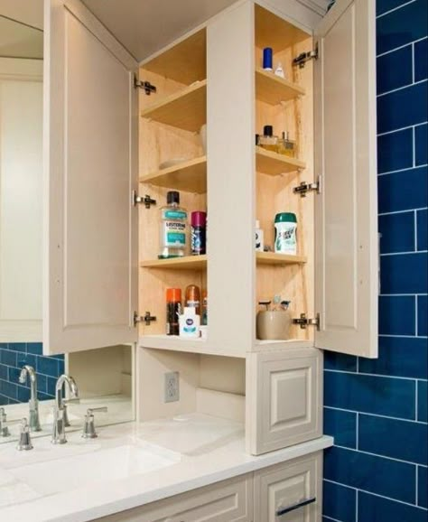 Modern Bathroom Storage Cabinet, Bathroom Vanity With Lots Of Storage, Hidden Bathroom Storage Ideas, Bathroom With A Lot Of Storage, Waterpik Storage, Corner Bathroom Vanity Ideas, Bathroom White Tiles, Bathroom Counter Cabinet, Bathroom Counter Storage Tower