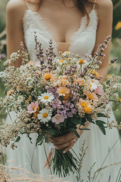 Discover 25 DIY wildflower bouquets that are as gorgeous as they are affordable! Find out how to make them for your big day. Click to learn more! #DIYweddingideas #rusticbride #wildflowers Wedding Arch With Wildflowers, Mauve Wildflower Bouquet, Flowers That Go Together Bouquet, Wild Flower Backyard Wedding, May Wildflower Wedding, Late Summer Wildflower Bouquet, Wild Flower Spring Wedding, Wedding Flowers Late Summer, Dark Green Wildflower Wedding