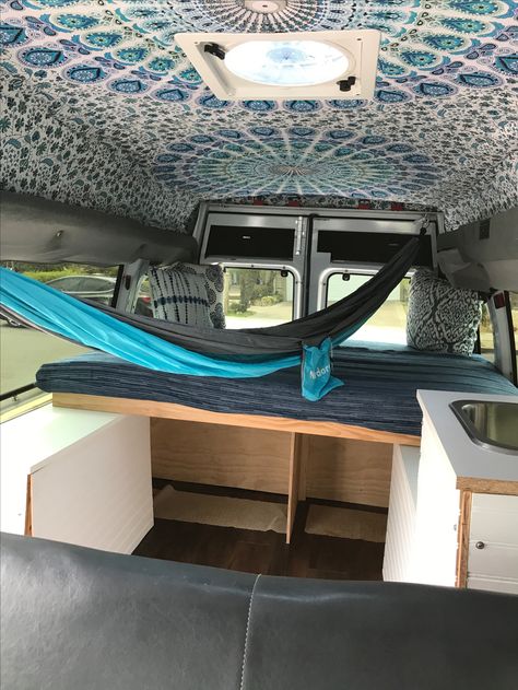 Storage below the bed.....and of course she installed a hammock for lounging. Hammock In Van, Transit Van, Hammock Bed, Cargo Trailers, Van Conversion, Ford Transit, Ambulance, Simple Living, Tiny Home