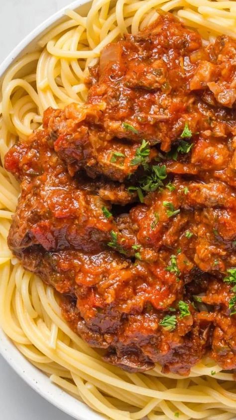 Short rib bolognese is an amazing one-pot meal, slowly braised and tender bites of beef short rib in a classic, flavor packed slow cooker bolognese sauce anyone can make. An easy short rib pasta sauce made with braised beef short rib, it's a comfort food that's perfect for family dinner recipes and easy meals. Short Rib Spaghetti Sauce, Short Rib Bolognese Sauce, Short Rib Bolognese, Short Rib Pasta, Short Rib Beef Stew, Short Rib Stew, Slow Cooker Bolognese Sauce, Homemade Pasta Salad, Perfect Meatloaf