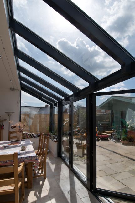 Lean to conservatories Lean To Glass Extension, Black Lean To Conservatory, Glazed Extension Kitchen, Glass Lean To Extension, Glass Lean To, Lean To Kitchen, Lean To Extension, Lean To Conservatory, Modern Conservatory