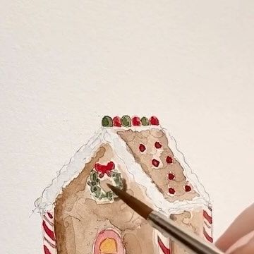 Emily Lex on Instagram: "Painting a gingerbread house. This cutie is featured on the cover of the Christmas watercolor workbook and you can paint along with me inside the book! (p.s. for the white, I used white gauche - you could also use a white gel pen). #elstudio #watercolor #watercolorwednesday #gingerbreadhouse" Gingerbread House Watercolor Painting, Watercolour Gingerbread House, Christmas House Watercolor, Watercolor Gingerbread Man, Easy Christmas Watercolor Paintings, Watercolor Gingerbread House, Gingerbread House Watercolor, Hand Painted Christmas Cards Watercolors, Gingerbread House Painting