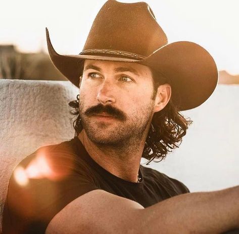 Cowboys With Long Hair, Cowboy With Mustache, Cash Jessica Peterson, Riley Green Hair, Cowboys With Mullets, Riley Green Wallpaper, Long Hair Cowboy, Cowboy Mullet, Rugged Gentleman Style